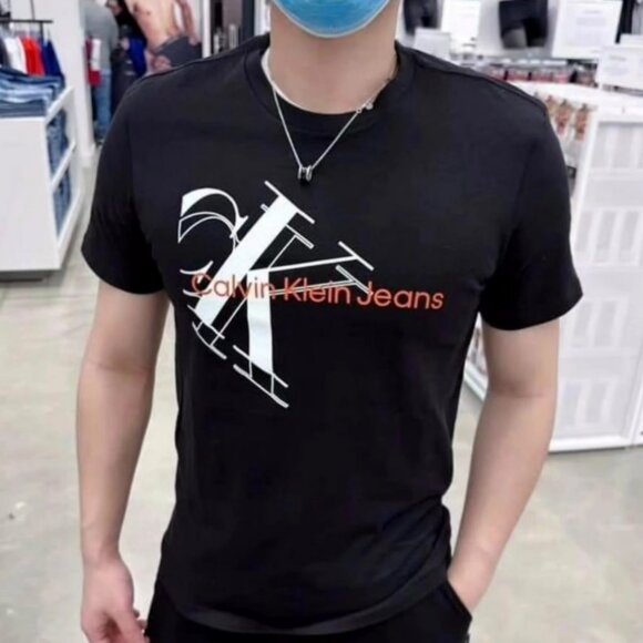 Calvin Klein Mens' CK Graphic Relaxed Fit Crew Neck Short Sleeve Tee in Black - Picture 1 of 10